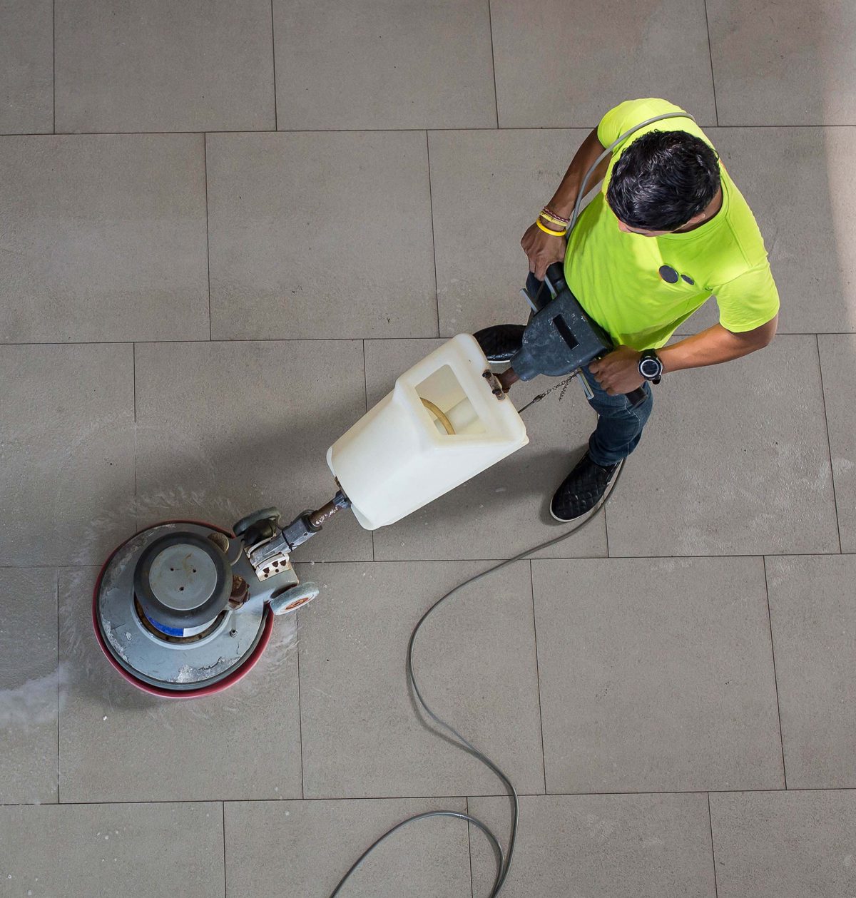 worker using circular saw to cut wood on a job site